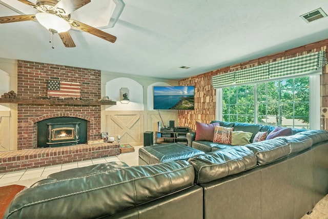 107 Oakwood Dr, Branson, MO 65616 - living area featuring ceiling fan, a fireplace, and tile patterned floors