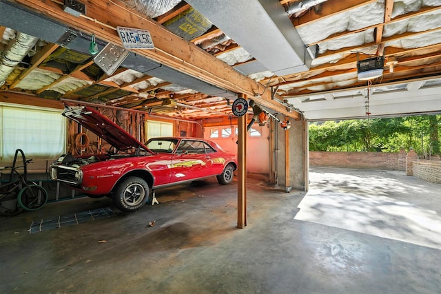 107 Oakwood Dr, Branson, MO 65616 - garage featuring a garage door opener