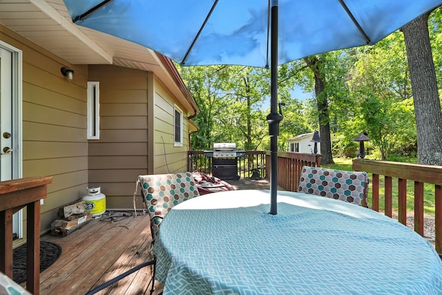 107 Oakwood Dr, Branson, MO 65616 - deck with outdoor dining space and area for grilling