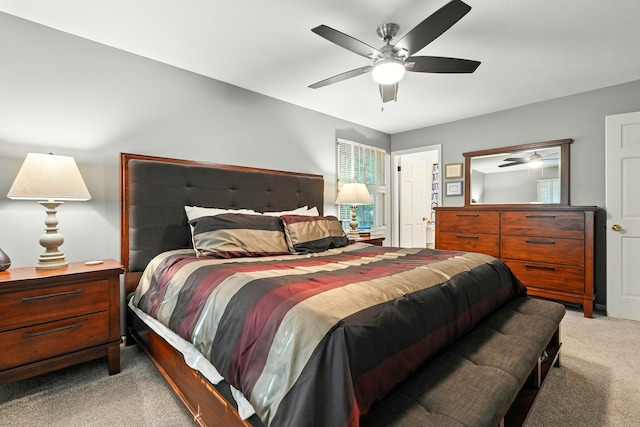 107 Oakwood Dr, Branson, MO 65616 - carpeted bedroom featuring a ceiling fan