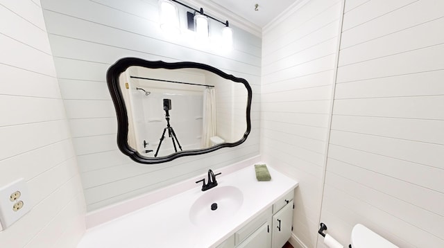 107 Oakwood Dr, Branson, MO 65616 - bathroom with ornamental molding, vanity, a shower with shower curtain, and tile walls