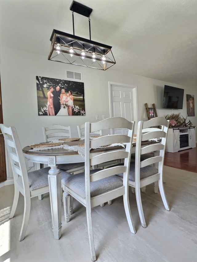 18189 2nd St, Eminence, MO 65466 - dining space featuring a chandelier