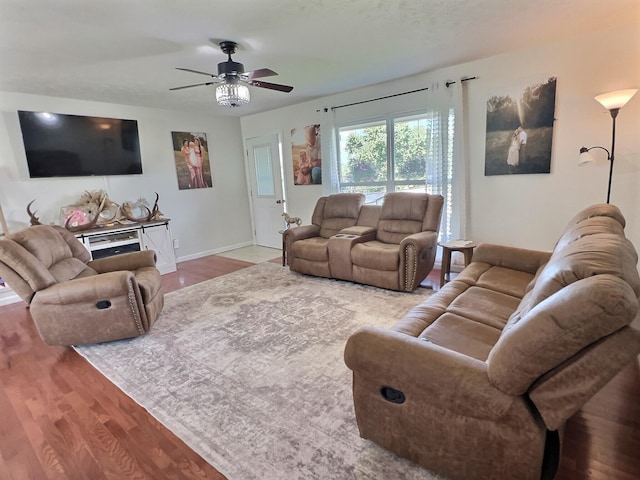 18189 2nd St, Eminence, MO 65466 - living area featuring wood finished floors and a ceiling fan