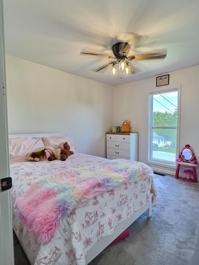 18189 2nd St, Eminence, MO 65466 - carpeted bedroom with a ceiling fan