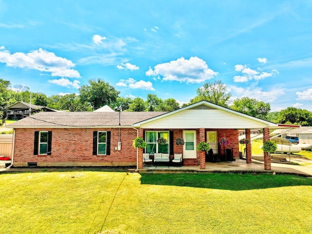 18189 2nd St, Eminence, MO 65466 - back of house featuring brick siding, a lawn, and a porch