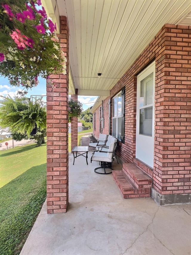 18189 2nd St, Eminence, MO 65466 - covered porch featuring a lawn