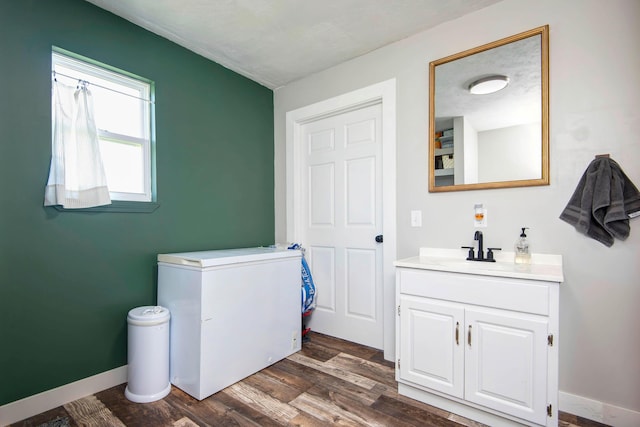 361 Durington Rd, Buffalo, MO 65622 - bathroom with vanity and wood finished floors