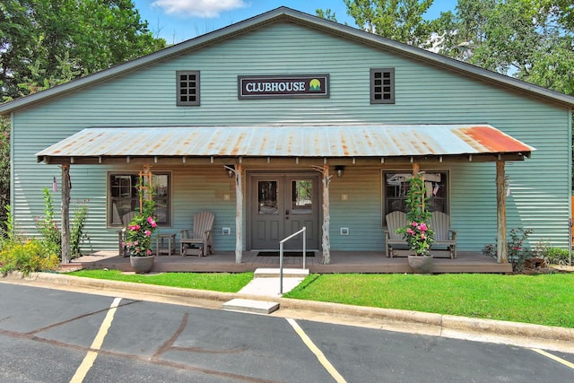 7815 Cozy Cove Rd Unit 3-15, Branson, MO 65616 - view of front facade featuring covered porch and a metal roof