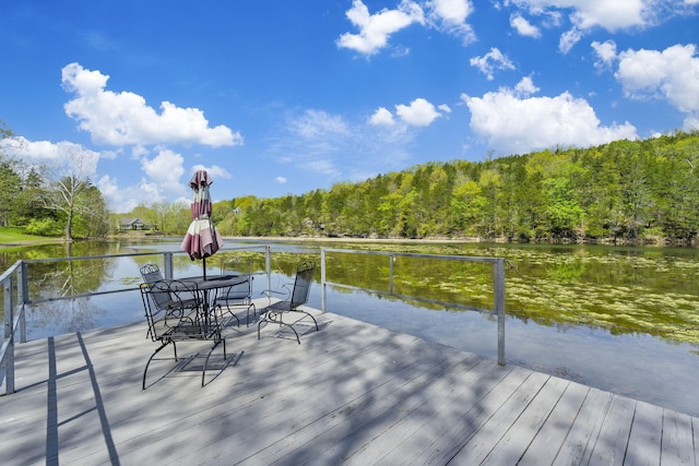 7815 Cozy Cove Rd Unit 3-15, Branson, MO 65616 - dock area featuring outdoor dining area, a wooded view, and a deck with water view