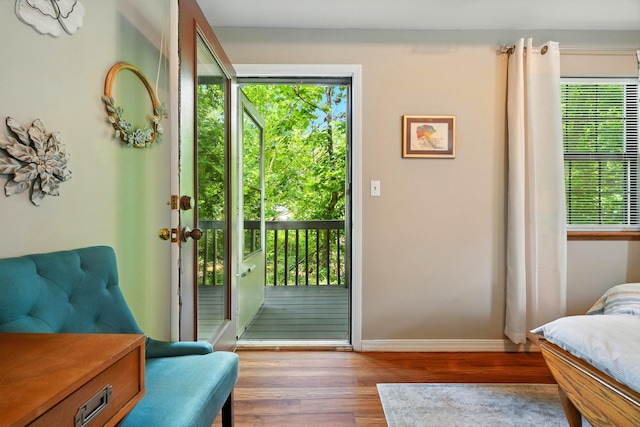 7815 Cozy Cove Rd Unit 3-15, Branson, MO 65616 - doorway to outside with wood finished floors and baseboards