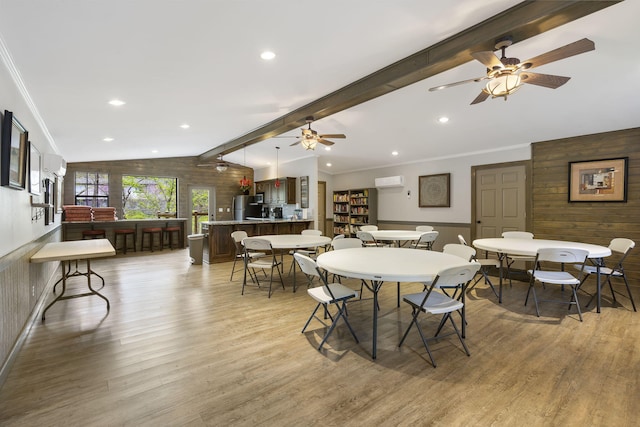 7815 Cozy Cove Rd Unit 3-15, Branson, MO 65616 - dining room with light wood-style floors, a wall mounted air conditioner, a ceiling fan, recessed lighting, and crown molding