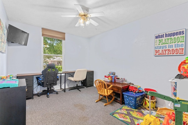 208 S Poplar Ct, Nixa, MO 65714 - rec room with a desk, carpet floors, ceiling fan, and a textured ceiling