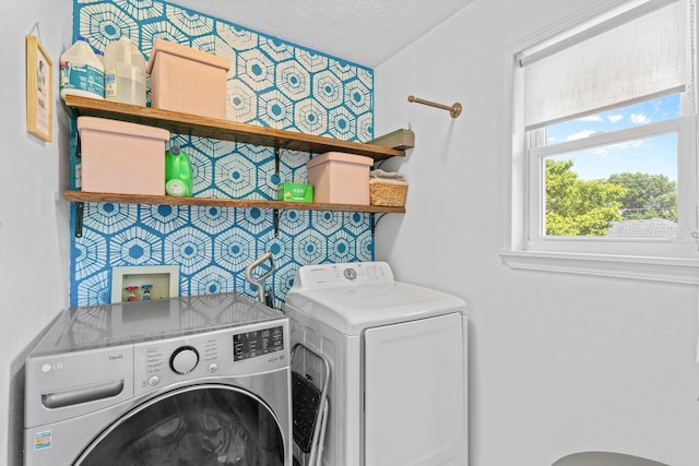 208 S Poplar Ct, Nixa, MO 65714 - laundry room with washing machine and dryer and a textured ceiling