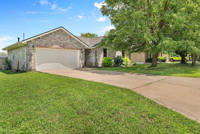 208 S Poplar Ct, Nixa, MO 65714 - view of front of property with an attached garage, a front yard, driveway, and brick siding