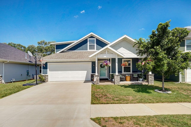 504 Gauge St, Willard, MO 65781 - craftsman-style house with driveway, a front lawn, a porch, and stone siding
