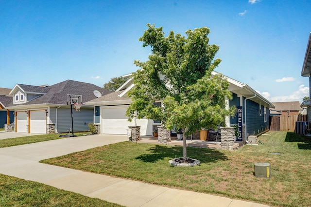504 Gauge St, Willard, MO 65781 - view of front of property featuring driveway, stone siding, an attached garage, and a shingled roof