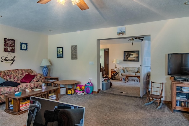 1746 Wall Rd, Mountain Grove, MO 65711 - living area featuring carpet flooring, ceiling fan, and a textured ceiling