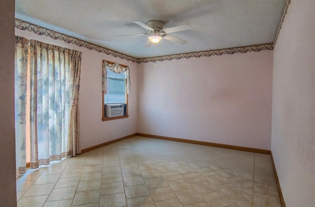 1746 Wall Rd, Mountain Grove, MO 65711 - empty room with ceiling fan, a textured ceiling, and light tile patterned floors