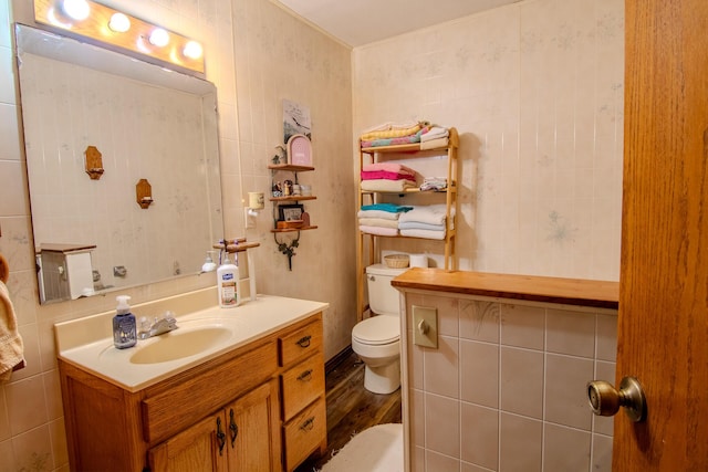 1746 Wall Rd, Mountain Grove, MO 65711 - bathroom with tile walls, vanity, and wood finished floors