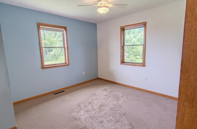 1746 Wall Rd, Mountain Grove, MO 65711 - carpeted spare room featuring healthy amount of natural light and a ceiling fan