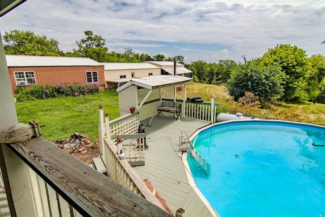 1746 Wall Rd, Mountain Grove, MO 65711 - swimming pool featuring a deck, a yard, and view of wooded area