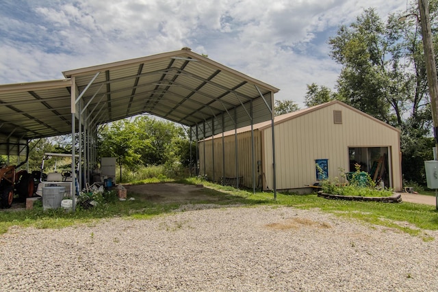 1746 Wall Rd, Mountain Grove, MO 65711 - view of car parking with a detached carport and driveway