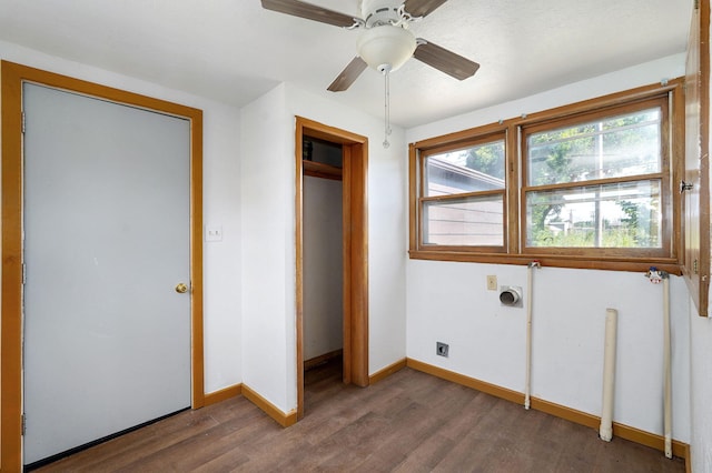 304 N Main St, Lockwood, MO 65682 - unfurnished bedroom featuring dark wood finished floors, a closet, and a ceiling fan