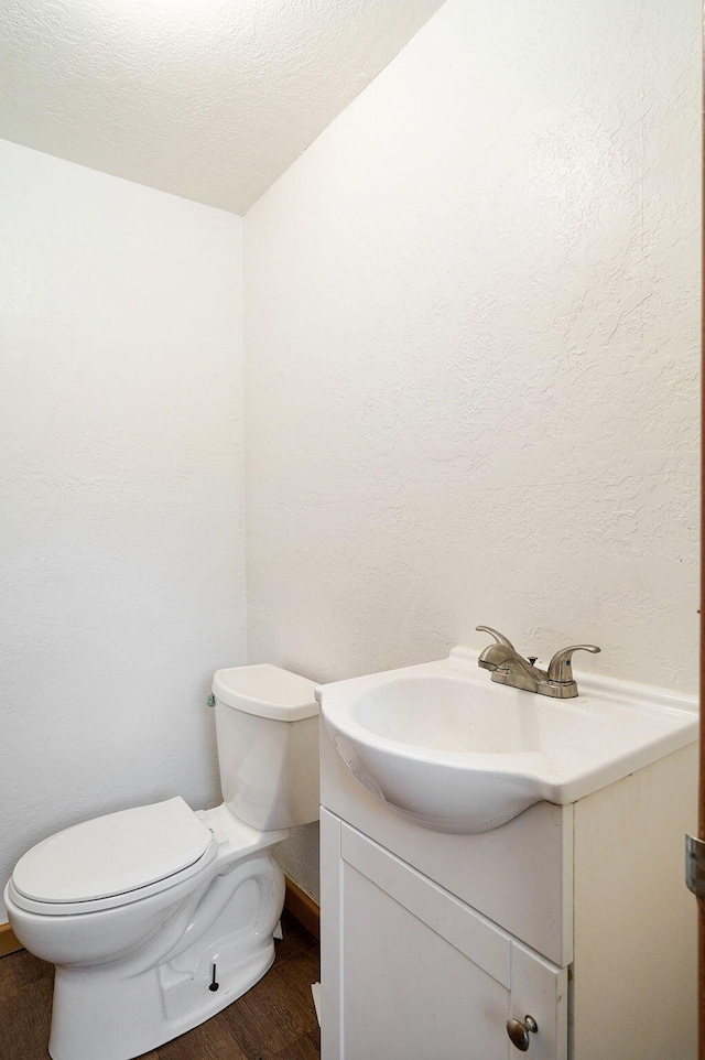 304 N Main St, Lockwood, MO 65682 - half bathroom with vanity and wood finished floors