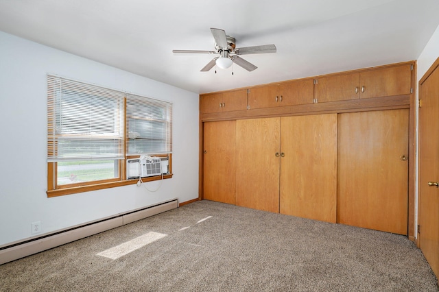 304 N Main St, Lockwood, MO 65682 - unfurnished bedroom with a baseboard radiator, a closet, carpet floors, cooling unit, and ceiling fan