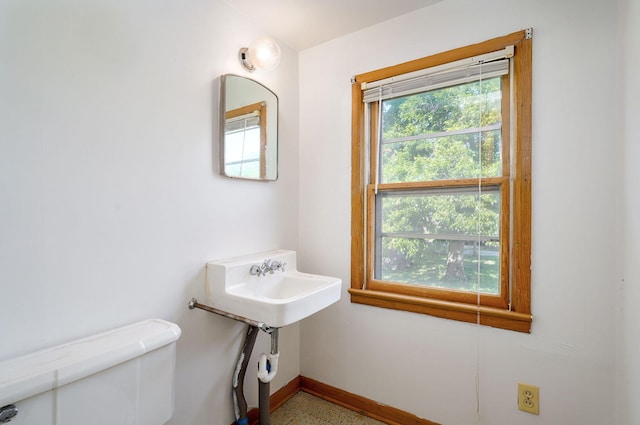 304 N Main St, Lockwood, MO 65682 - half bathroom featuring toilet and speckled floor
