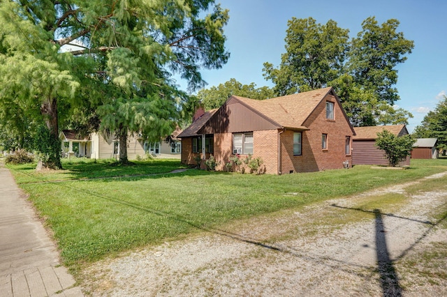 304 N Main St, Lockwood, MO 65682 - view of side of home with brick siding, a yard, a chimney, and roof with shingles