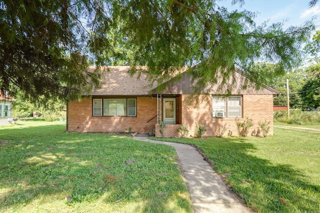 304 N Main St, Lockwood, MO 65682 - ranch-style house featuring a front yard and brick siding