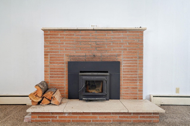 304 N Main St, Lockwood, MO 65682 - detailed view of carpet flooring, baseboard heating, and a fireplace