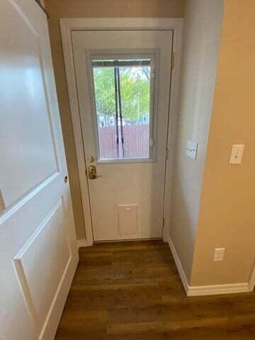 203 Forest Park Ln, Branson, MO 65616 - doorway to outside with wood finished floors