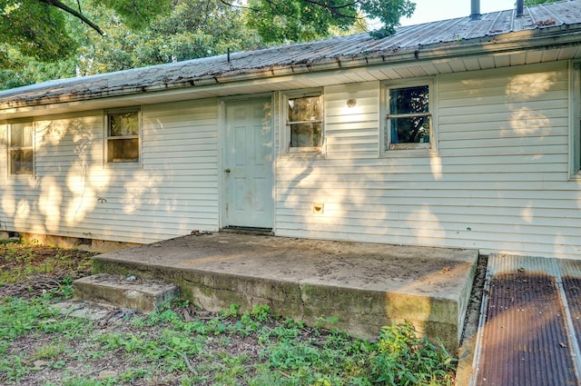 225 S Main St, Greenfield, MO 65661 - back of house featuring a metal roof