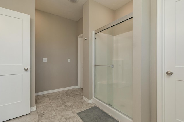 1929 N Brookhollow Dr, Nixa, MO 65714 - full bathroom with a stall shower and baseboards