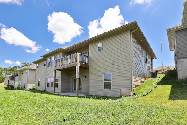 1929 N Brookhollow Dr, Nixa, MO 65714 - back of house featuring a balcony, a yard, and a patio