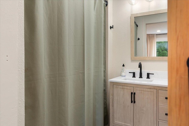 103 W Secluded Ln, Nixa, MO 65714 - full bathroom with vanity, a shower with shower curtain, and a textured wall