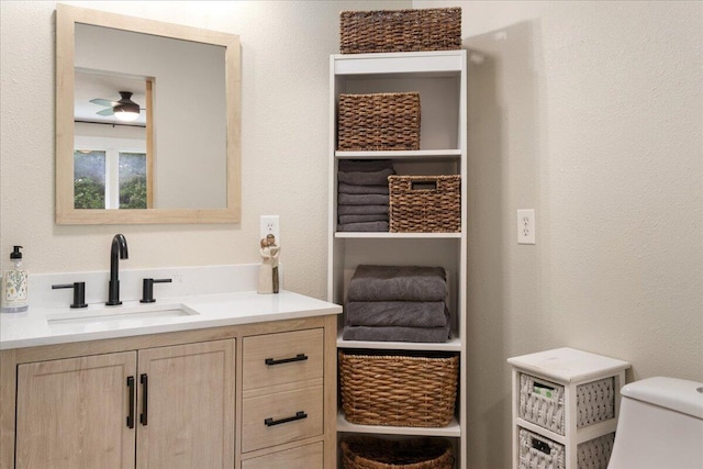 103 W Secluded Ln, Nixa, MO 65714 - bathroom featuring a ceiling fan and vanity