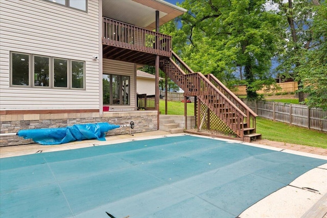 103 W Secluded Ln, Nixa, MO 65714 - view of swimming pool with stairs, a fenced backyard, a wooden deck, and a patio