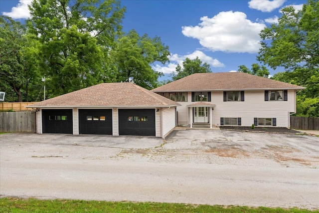 103 W Secluded Ln, Nixa, MO 65714 - view of front of house featuring a garage