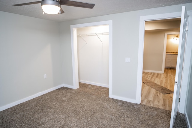 1719 N Pine St, Marshfield, MO 65706 - unfurnished bedroom with carpet flooring, a closet, and a ceiling fan