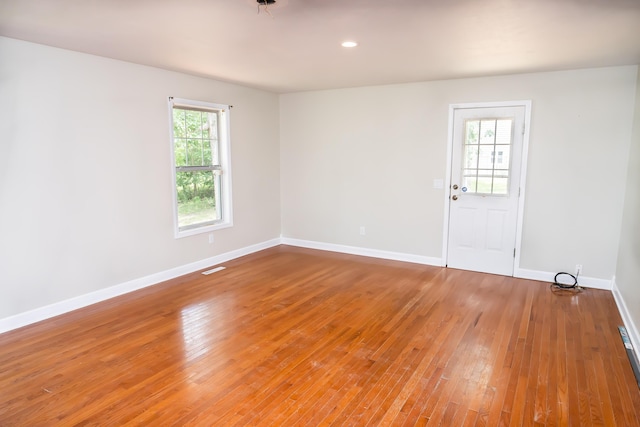 1719 N Pine St, Marshfield, MO 65706 - spare room with healthy amount of natural light and light wood-type flooring