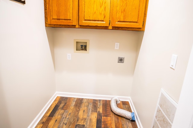 1719 N Pine St, Marshfield, MO 65706 - laundry room with hookup for an electric dryer, hookup for a washing machine, cabinet space, and wood finished floors