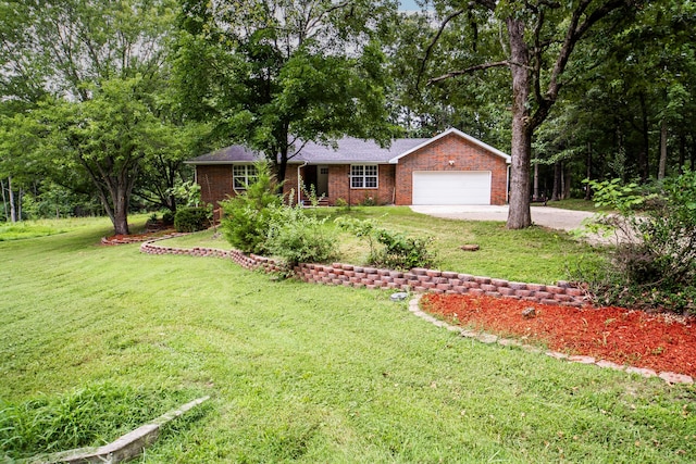 1719 N Pine St, Marshfield, MO 65706 - single story home featuring a garage, concrete driveway, brick siding, and a front yard