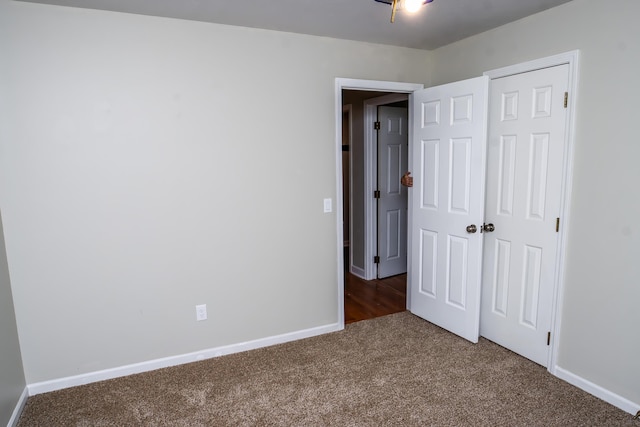 1719 N Pine St, Marshfield, MO 65706 - unfurnished bedroom with carpet floors and a closet