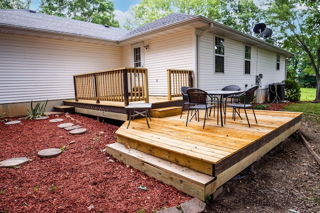 1719 N Pine St, Marshfield, MO 65706 - wooden terrace featuring outdoor dining space