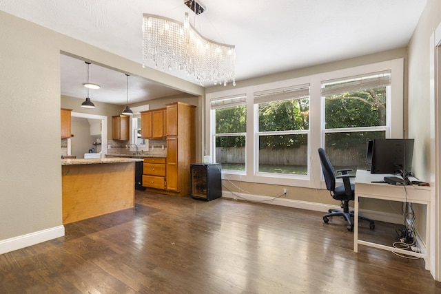 526 S Mccanse St, Mount Vernon, MO 65712 - home office featuring dark wood-type flooring and a chandelier