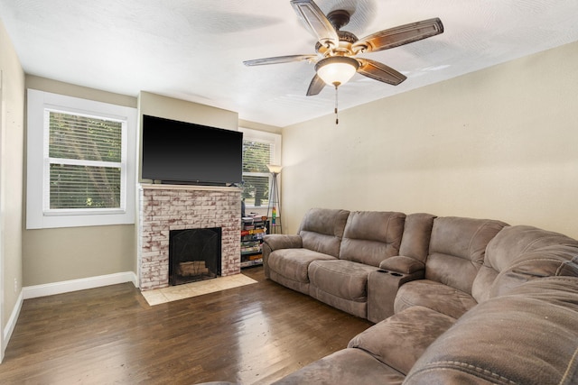 526 S Mccanse St, Mount Vernon, MO 65712 - living room with wood finished floors, healthy amount of natural light, a fireplace, and ceiling fan