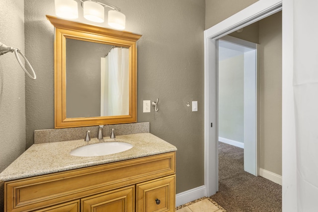 526 S Mccanse St, Mount Vernon, MO 65712 - full bathroom featuring vanity and baseboards